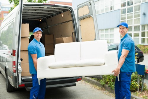 Office relocation planning in Elephant And Castle with a moving team preparing business equipment