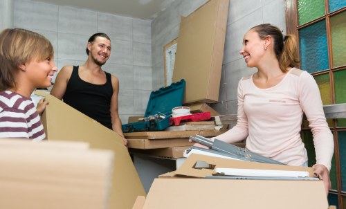 Furniture pick-up team handling bulky household items in Elephant and Castle