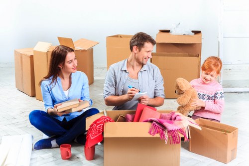Unpacking household items into a new flat near Elephant and Castle