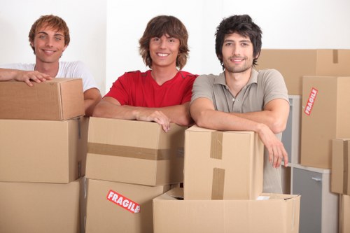 Careful packing and loading of office equipment for a local move