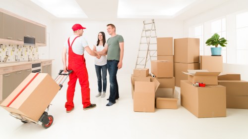 Commercial office removal with desks and equipment being transported locally