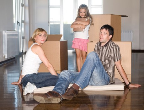 Local team handling desks and boxes during an office relocation