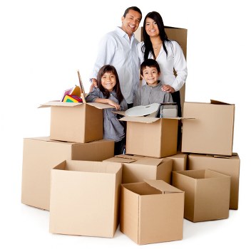 Team handling desks and packed office boxes during a South London relocation